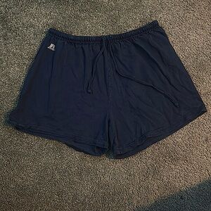 Navy medium shorts brand-Russell and has an elastic waistband with drawstrings.